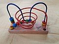 Image 7A bead maze (from List of wooden toys)