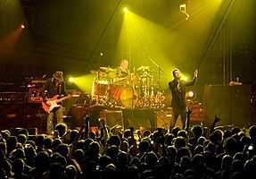 The Verve performing at Madison Square Garden in 2008. From left to right: Nick McCabe, Peter Salisbury, Richard Ashcroft and, out of sight, Simon Jones