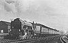 An LNER A1 class locomotive pulling a passenger train in 1951