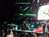 Los Temerarios performing onstage.