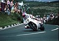 Steve Hislop riding the rotary-engined Norton RCW 588 at the Creg-ny-Baa in 1992, with the white building of Kate's Cottage visible in background