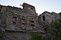 The attached image, taken on 8 July 2017, depicts the side of a house in the Zurayb neighborhood. It illustrates the architectural features that reflect the building's connection to adjacent houses, which were demolished prior to the photograph being taken.