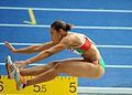 Image 35Naide Gomes in the jumping phase of the event (from Track and field)