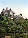 Coloured black and white photograph: the Burgberg with Wernigerode Castle (between 1890 and 1905)