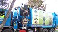 An Australian waste disposal truck taking plant and related 'green' organic wast to a compost site.