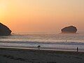 The beach and Gull Rock at sunset