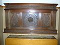 A highly carved mantelpiece in Gateside Memorial Hall.