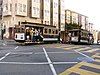 Two San Francisco Cable Cars built by Carter Brothers pass each other in 2005