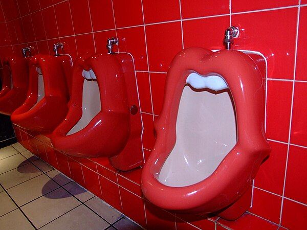 Novelty urinals in a bar in Brighton, an example of sexual humor