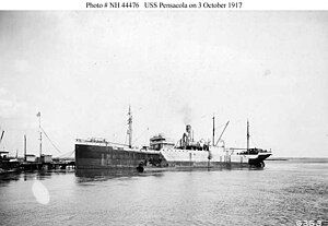 At the Charleston, South Carolina, Navy Yard on 3 October 1917, five days before her commissioning. Formerly the German Nicaria, seized by the United States in April 1917, Pensacola was designated AK-7 in 1920.