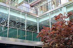 View of offices on the second floor, as seen from the building's courtyard