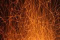 This is an unaltered picture of sparks coming from a camp fire.