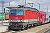 An electric locomotive at the front of an ÖBB passenger train at St. Pölten, Austria, in 2013