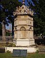 Monument to Thomas Hobson, at the point where the conduit crosses Lensfield Road, at its eastern end.