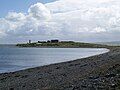 Beach with lighthouse visible