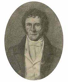 A pencil or charcoal portrait of a white man in clothes fashionable during the early 1800s. He is clean shaven with curly hair a couple inches long. His coat is black while his shirt, vest, and bowtie are white. He has high cheek bones.