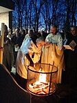 Benedictine monks around an Easter fire prior to Easter Vigil mass in Morristown, New Jersey