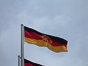 National flag of the German Democratic Republic flying