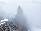 Tokaloo Spire shrouded in clouds