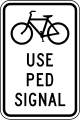 R9-5 Bicycles use pedestrian signal