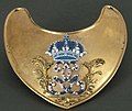 Gorget, silver gilt, for majors, lieutenant-colonels and colonels of the Swedish Army, with the royal cypher of Gustav III and two palm branches, all enameled. Swedish Army Museum.