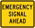 W11-12P Emergency signal ahead (plaque)