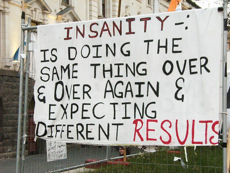 File:Insanity Occupy Sign.jpg