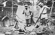 Japanese vigilantes with murdered victims in the aftermath of the Kanto earthquake.