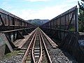 The windbreaks extend well above the plate girders.