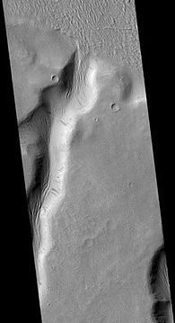 Tinia Valles, as seen by HiRISE. Full size image shows dark slope streaks.