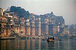 Hindus putting lit candles on the river Ganges.