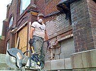 Man doing brick repair