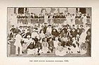 The first session of the Indian National Congress in 1885. A. O. Hume, the founder, is shown in the middle (third row from the front). The Congress was the first modern nationalist movement to emerge in the British Empire in Asia and Africa.[395]