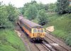 A BR class 504 train on the Bury Line just before Metrolink conversion in 1991