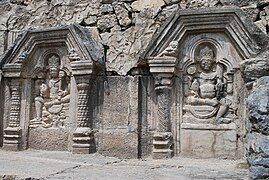 Sculptures in the Martand Temple. The trefoil arch is a characteristic feature of Brahminical temple architecture in Kashmir.[69]