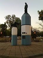 San Martín memorial at the middle of the namesake garden square in downtown at twilight.