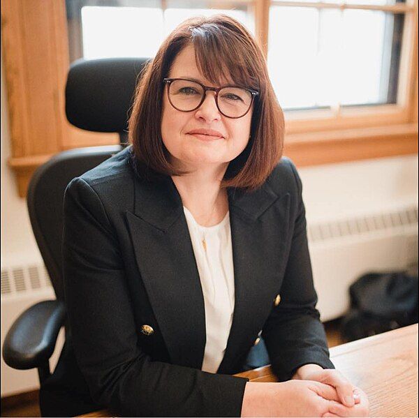 File:Carla at desk.jpg