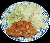 Kotlet z indyka turkey cutlet with spring onion mashed potato, cucumber and radish salad