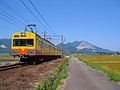 A train between Misato and Nyūgawa Stations