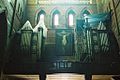 The organ, dating from 1901, and painting of the Crucifixion. Both are on the liturgical West wall beneath the rose window.