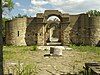 Central view towards the entrance and apse of a partially preserved medieval church