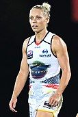 Erin Phillips playing football