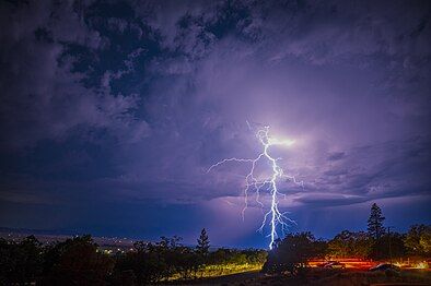 Cloud-to-ground lightning strike by Phiteros