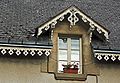 Decorative fretwork at the eaves - not just the window.