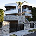 Contemporary pavilion style house with an angled facade in Mosman