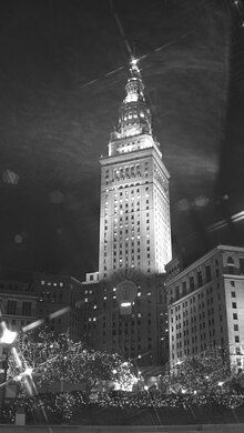 Black and white image of the Terminal Tower in Public Square at night