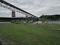 New 2014 bridge between Cornwall and Akwesasne, Ontario, Canada. New bridge is lower bridge. Old bridge is higher bridge. It is scheduled to be removed.