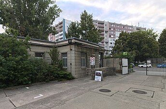 Low-rise building on property, north corner