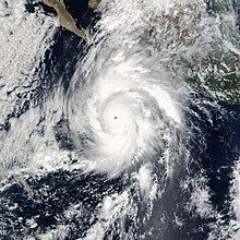 A satellite image of a Category 5 hurricane over the Eastern Pacific Ocean, off the coast of Mexico