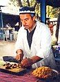 Image 14A man makes plov, the national dish of Tajikistan. (from Culture of Tajikistan)